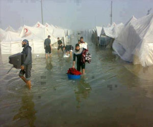   مصر اليوم - عاصفة ثلجية غير مسبوقة تضرب مخيم الزعتري
