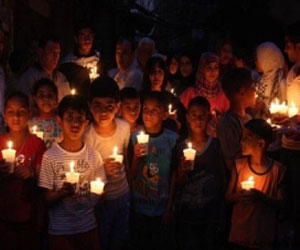   مصر اليوم - مسيرة شموع في جنين تضامنًا مع الأسرى المضربين