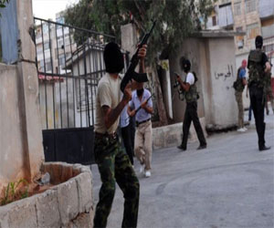 مصر اليوم - وحدات من الجيش السوري تشتبك مع مسلحين في حمص