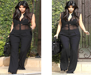 مصر اليوم - كاردشيان ترتدي بدلة سوداء جريئة تكشف عن بطنها