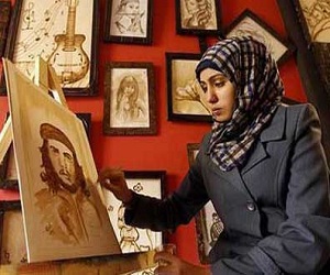   مصر اليوم - فنانة فلسطينية ترسم لوحاتها بالقهوة بدلاً من الألوان