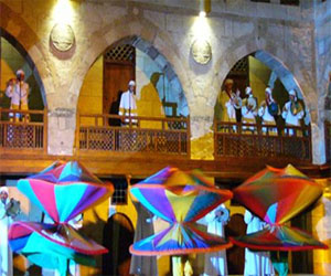   مصر اليوم - التنورة تشارك في احتفالات تعامد الشمس على وجه رمسيس الثاني