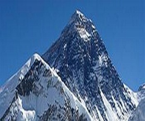   مصر اليوم - إمرأة تصعد أعلى قمة جبل في العالم مرتين لتدخل غينيس