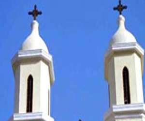   مصر اليوم - الهدوء يسيطر على محيط كنيسة مار جرجس في كوم إمبو