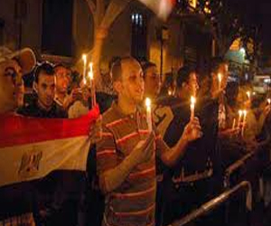   مصر اليوم - وقفة احتجاجية صامتة بالشموع للتيار الشعبي في الأقصر