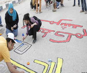   مصر اليوم - رسوم غرافيتي بالقرب من مقر الإخوان المسلمين تتسبب في اشتباكات