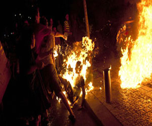   مصر اليوم - وفاة راهب أضرم النار في نفسه في جنوب غرب الصين