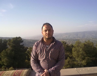 مصر اليوم - بطل العرب في المصارعة ينشق عن النظام الأسد