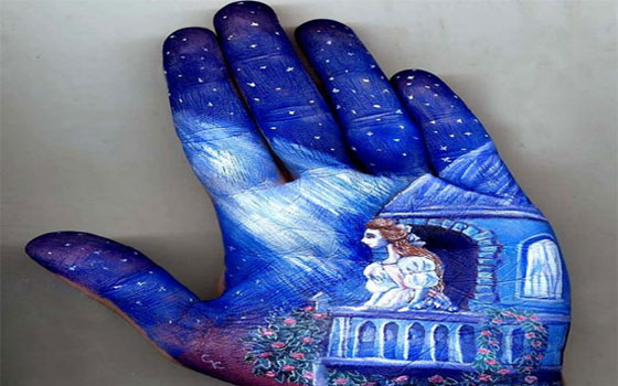   مصر اليوم - فنانة روسية ترسم لوحات خيالية غريبة الأطوار على كف اليد