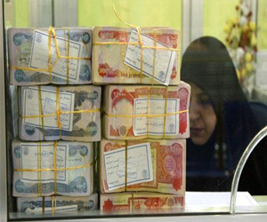   مصر اليوم - العراق: بدء إجراءات حذف 3 أصفار من العملة