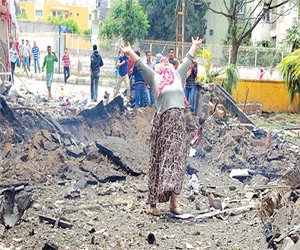  مصر اليوم - عشرات القتلى في تفجيرين في تركيا وسورية المتهم الأول