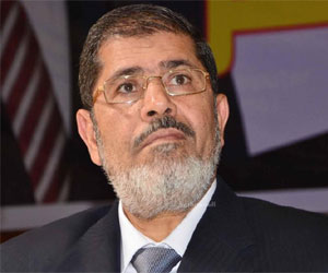   مصر اليوم - تقرير حقوقي يقيم أداء مرسي خلال الأزمات الأخيرة