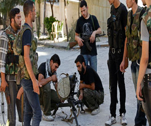   مصر اليوم - الحكومة السورية تشتري الذخائر من مقاتلي الحر