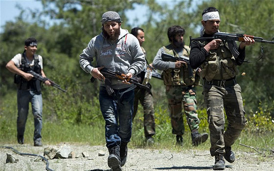 مصر اليوم - المقاتلون الأجانب يجعلون من سورية المسرح الأول لـالجهاد العالمي