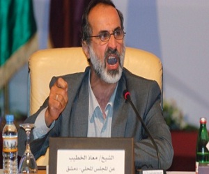   مصر اليوم - معاذ الخطيب ينتقد فتوى القرضاوي بالجهاد في سورية