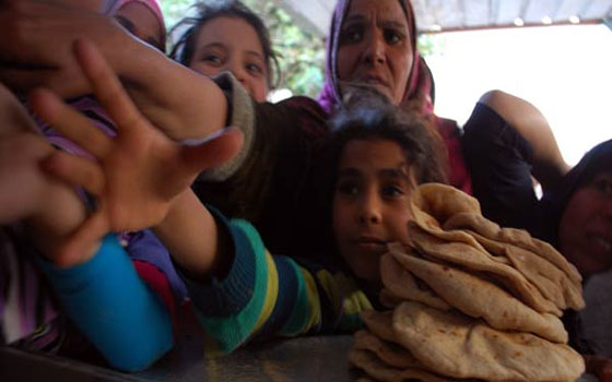 مصر اليوم - صعوبة إيصال المادة من المستودعات في ريف دمشق سبب في الاختناقات على الأفران