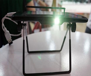 مصر اليوم - LumiTap أول حاسب لوحي مزود ببروجيكتور