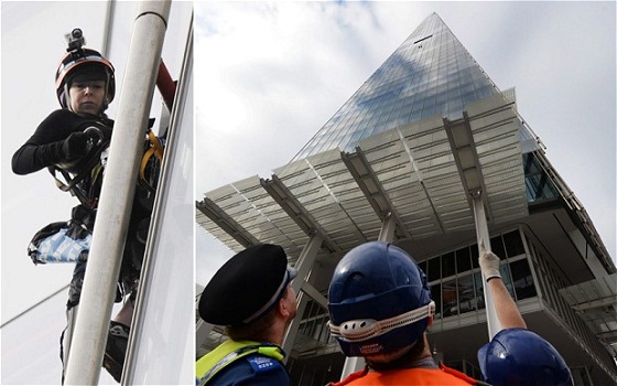 مصر اليوم - فتيات جرين بيس يتسلقن مبنى شارد للاحتجاج على سياسة شيل