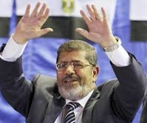   مصر اليوم - قناع مرسي أحدث صيحة لمعتصمي رابعة العدوية