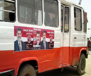   مصر اليوم - مشادّات بين الأمن و8 أتوبيسات لأنصار مرسي في السويس