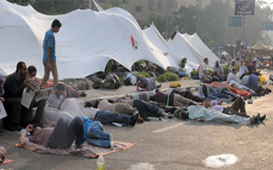   مصر اليوم - الهدوء يسود محيط جامعة القاهرة وميدان التحرير واعتصام رابعة العدوية