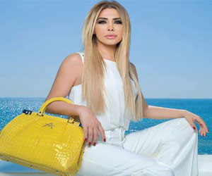   مصر اليوم - نوال الزغبي سفيرة موضة الحقائب في الوطن العربي