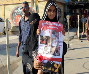   مصر اليوم - صور لمرسي والسيسي احتفالاً بالعيد في السويس