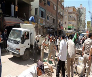   مصر اليوم - إزالة 14 حالة إشغال طريق في شارع الكورنيش في مطروح