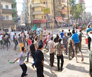   مصر اليوم - اشتباكات بين اعضاء التيار الشعبي وأنصار مرسي في السويس