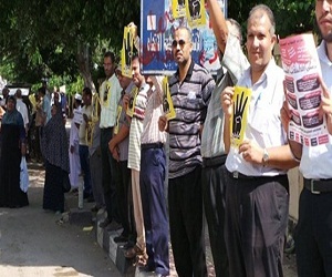   مصر اليوم - سلسلة بشرية للمطالبة بعودة الشرعية في المنصورة