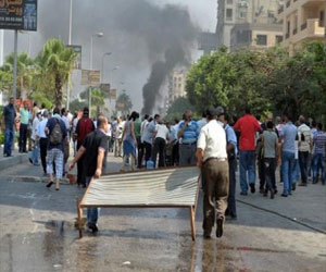   مصر اليوم - اشتباكات بين الأمن وأنصار مرسي في الجيزة