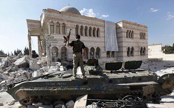   مصر اليوم - 50 تشكيلاً سوريًا يتوحَّدون في مجلس قيادة الثورة ويسحبون اعترافهم بالائتلاف