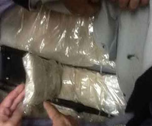   مصر اليوم - ضبط بانجو وهيروين بحوزة عامل نظافة في رأس غارب