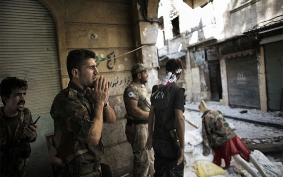   مصر اليوم - الحر يسيطر على قريتين في محيط مستودعات الأسلحة في حمص