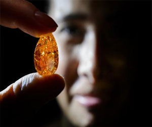   مصر اليوم - أكبر ماسة برتقالية في العالم تباع بسعر قدره 35.54 مليون دولار