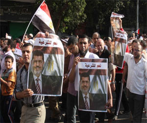   مصر اليوم - مسيرة لأنصار الإخوان في قنا احتجاجًا على مُحاكمة مرسي