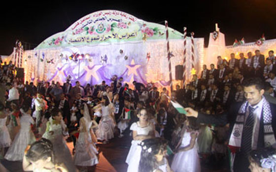   مصر اليوم - استعدادات لتنظيم أضخم عرس جماعي في الضَّفة الغربيَّة بتمويل إماراتي