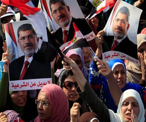   مصر اليوم - اشتباكات محدودة بين بعض أهالي المنوفية وعشرات الإخوان خلال مسيرة مؤيدة لمرسي