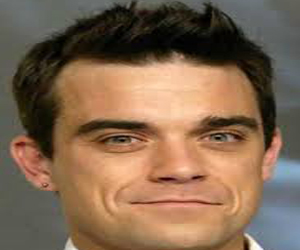   مصر اليوم - لنجم البريطاني روبي وليامز يزرع شَعرًا بسبب الضجر