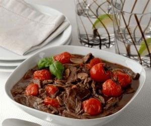   مصر اليوم - شرائح اللحم المقليّة مع الطماطم الصغيرة المشوية على الطريقة الإسبانية