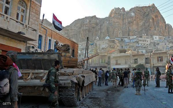   مصر اليوم - قوّات الحكومة والمعارضة تنهب وتسرق وتخرّب بلدة معلولا الأثريّة