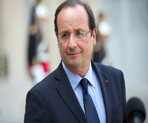   مصر اليوم - الرئيس الفرنسي يحضر جنازة نيلسون مانديلا