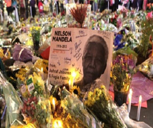   مصر اليوم - الإليزيه: الرئيس الفرنسي يحضر مراسم تشييع جنازة مانديلا الأحد المقبل