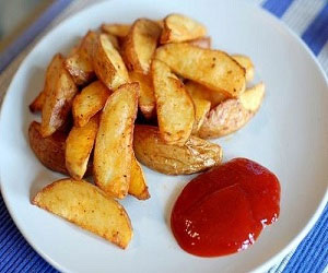   مصر اليوم - أجنحة البطاطس الحارة في الفرن