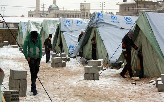   مصر اليوم - وفاة أكثر من 20 سوريًا بسبب البرد القارس وإعلان الشمال منطقة منكوبة