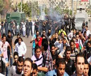   مصر اليوم - طلاب الإخوان يشعلون النار بغرفة للأمن الادارى واعتداء على اعلاميين