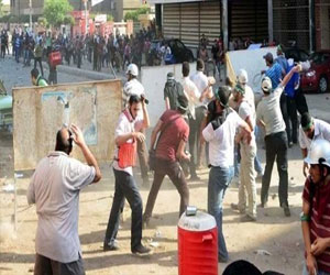   مصر اليوم - اشتباكات بين مؤيدي مرسي والأمن في دمياط الجديدة