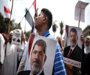   مصر اليوم - مسيرة لأنصار مرسي في العمرانية والأمن يطلق الغاز المسيل للدموع
