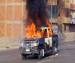   مصر اليوم - مجهولون يشعلون النار في سيارتي شرطة بمدينة 6 أكتوبر