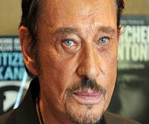   مصر اليوم - إتهام المطرب جوني هاليداي بالتهرب من الضرائب